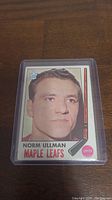 Front of 1969-70 Topps Norm Ullman hockey card showing portrait, team and position details.