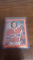 Front of the 1973-74 Topps Guy Lafleur hockey card showing photo and text.