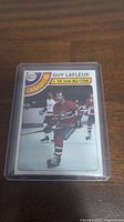 Front of 1978-79 Topps Guy Lafleur hockey card showing player image and All Star designation.