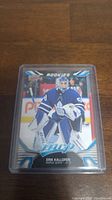 Front of Erik Kallgren rookie MVP hockey card showing player image and design