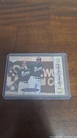 Front of Michael Jordan 1994 Upper Deck Michael Ones baseball card in protective case showing Jordan in Atlanta Braves uniform.