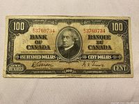 Front obverse view showing portrait, serial number, signatures and denomination.