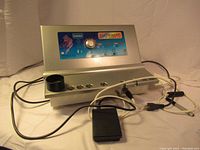 Full view of vintage Phytoscan HFD skincare machine with connected foot pedal and multiple cables.