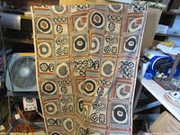 Full view of the vintage tapestry showing the overall pattern and colors.