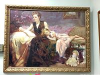 Frontal view of entire framed canvas depicting a woman reading to a child with a doll at her feet