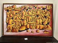 Framed colorful painting on canvas depicting abstract human figures holding fruit and bread, predominantly in yellow and orange tones.