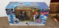 Front of boxed two-pack showing Tommy Salo and Saku Koivu figurines with team logos and NHL branding