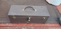 Front view of the vintage Kennedy toolbox with visible handle, latch, and embossed brand logo.
