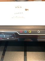 Close-up of the front panel showing ink level indicators and control buttons.