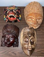 Photo showing all four masks together on a flat surface.