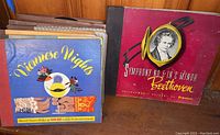 Photo showing Vienna Nights and Beethoven Symphony No. 5 record albums with vintage style cover art.