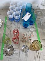 Full overview of all the glasses in the lot showing multiple styles and colors combined