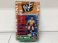 Front view of unopened WWF Live Wire Ken Shamrock action figure in original package with chair and accessories.