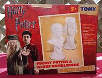 Front of boxed Harry Potter TOMY Character Casting Kit showing Harry Potter and Albus Dumbledore busts
