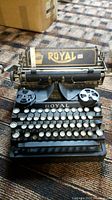 Front view of the Royal Standard typewriter showing the keyboard, ribbon spools, and Royal branding on the body.