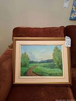 Full view of framed oil painting showing landscape with dirt path and trees, titled "Summer Dreams".