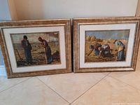 Photo of both framed tapestries side by side on floor, showing full front view of woven rural scenes