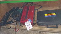Overview photo of timing lights, volt meter, and Stant cooling system tester case with cables and clamps visible.