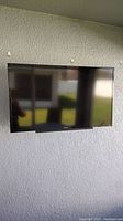 Front view of the Sony 42-inch LED television mounted on a wall.
