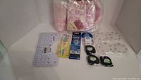 Full view of party supplies, Oral-B products, pill containers, and Paperwhite related item in packaging