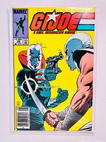 Front cover of GI Joe #38 comic book showing two characters in combat on yellow background, Marvel logo, price $1.00, issue number 38, August date.