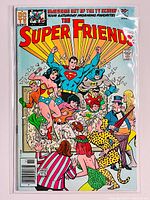 Full front cover of The Super Friends #1 comic book showing superheroes and villains breaking through a glass pane.