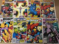 Eight Spider-Man comics arranged in two rows of four showing colorful covers featuring Spider-Man and other Marvel characters.