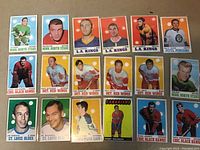 Photo showing all 18 hockey cards laid out and visible, confirming player names, teams and card condition.