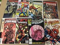 Photo showing all six Spider-Man comics fanned out with visible covers