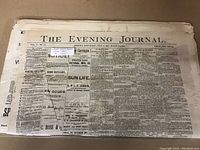 Front page of one newspaper showing masthead 'The Evening Journal', Ottawa, Saturday, July 2, 1887, price two cents, featuring columns of news and advertisements.