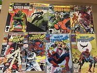 Front view of all 8 Web of Spider-Man comics, displayed side-by-side, showcasing cover art and variation in titles and issues.