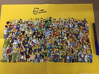 Full view of the poster showing a large group of The Simpsons characters on a yellow background with visible creases.