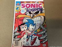 Front cover of Sonic the Hedgehog #1 comic book showing Sonic and other characters, priced $1.50, dated March, with colorful and detailed artwork