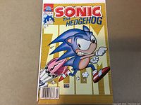 Front cover of Sonic the Hedgehog Issue #2 comic showing Sonic running.