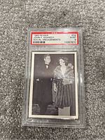 Photo of 1963 Rosan John F Kennedy Social Engagements trading card in PSA graded slab with a grade of 9 Mint.