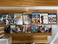 Wide view of all DVD and Blu-ray cases laid out showing spine and cover art.