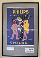 Full view of framed Philips French razor advertisement poster showing men and woman illustration with double-headed razor on tree.