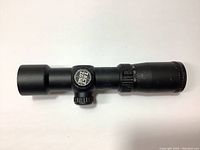 Side view of Excalibur Tact Zone crossbow scope showing branding on adjustment turret and matte black finish.