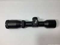 Black matte finish Octane Dead Zone crossbow scope shown horizontally on white background, side view of scope body and turret.