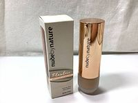 Photo of Nude By Nature Flawless Liquid Foundation with box and bottle showing front and branding.