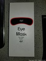 Front of box showing DPL Eye Mask Pain Relief System branding and product image.