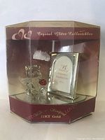 Front view of the LovinBox 22 KT Gold Crystal Angel Bear collectible inside its original packaging showing the bear and the framed plaque.