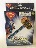 Front view of original packaging showing Superman Inflatable 36" Mallet graphic, with Superman flying and logo, warnings and DC logos.