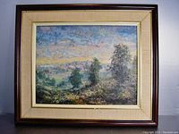 Framed impressionist landscape painting showing overall condition and frame detail.