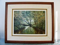 Frontal view of the framed oil painting showing full composition and mat