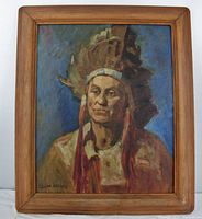 Full view of the framed oil painting showing the native chief in a feathered headdress with signature visible.