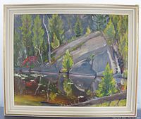 Framed original oil painting showing rocky landscape with trees and reflection in water.