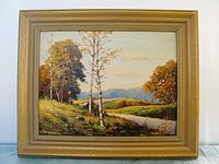 Full view of the original oil painting on board showing autumn landscape with trees, river, hills, and signature W. Blackwood in bottom left.