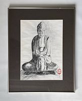 Full view of the framed black and white sketch of seated Buddha. The image shows detailed shading and figure posture.