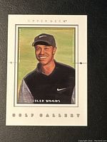 Front side of the card showing Tiger Woods' portrait with Upper Deck branding and golf gallery text.